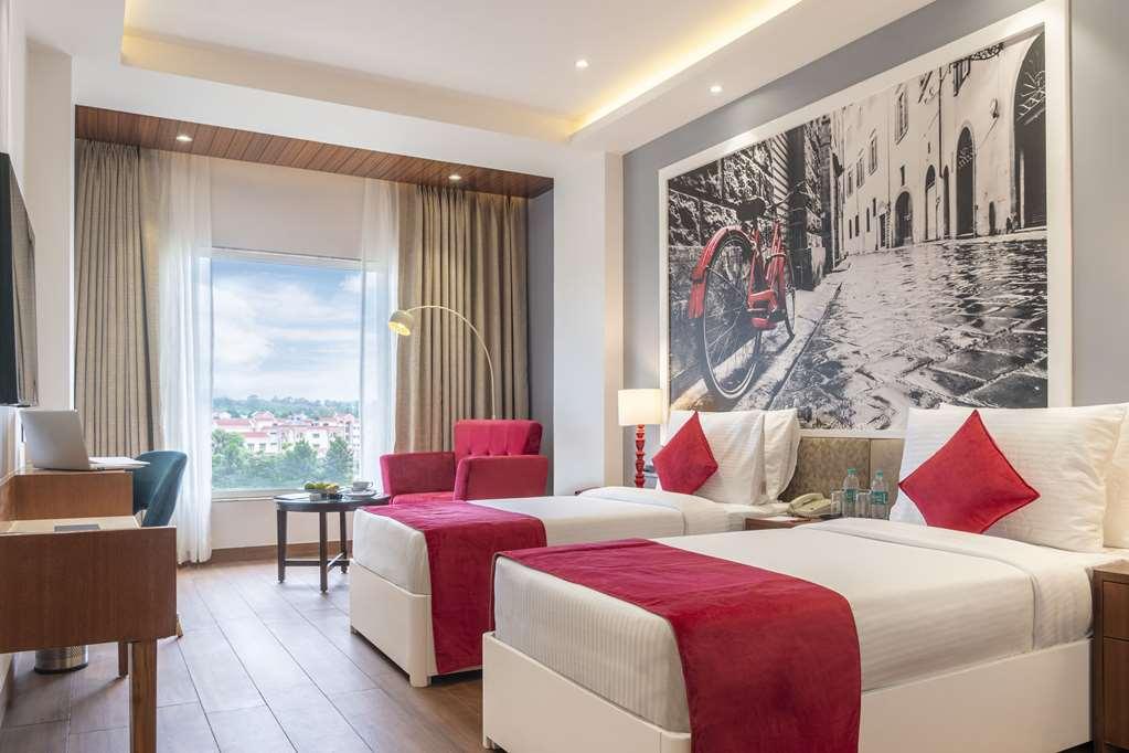 Clarion Hotel Epicure Деградун Номер фото